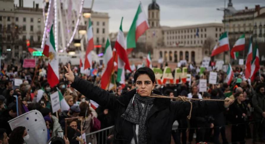 Hundreds protest in France to remember deceased Iranian