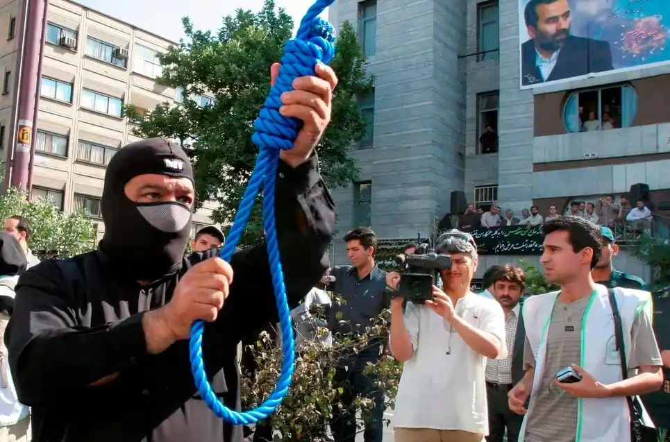 An Iranian policeman preparing a public execution in 2007 in Tehran