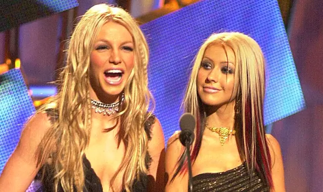 Britney Spears and Christina Aguilera during MTV VMA 2000 Stage at Radio City Music Hall in New York City, New York, United States.